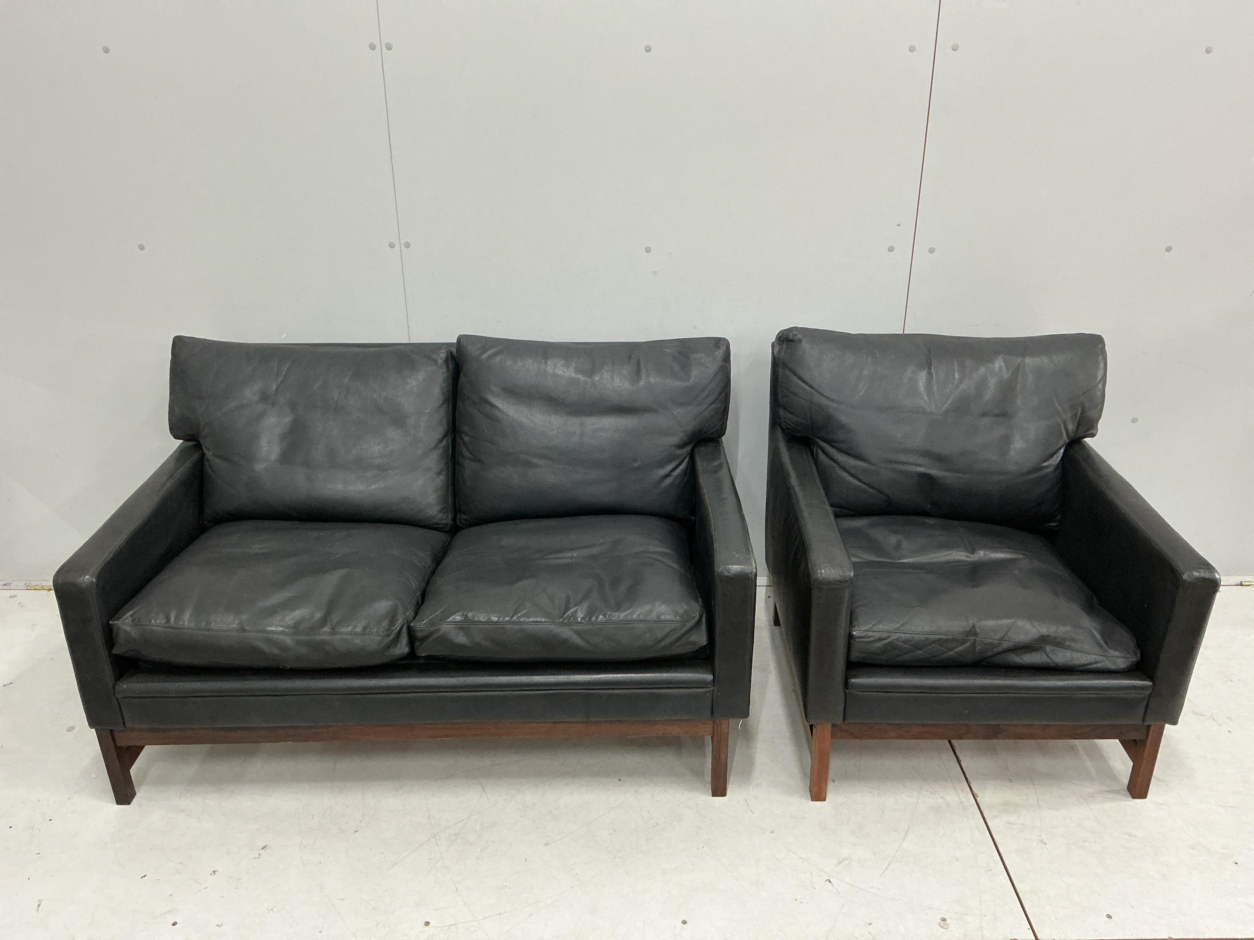 A Swedish two seat sofa and armchair